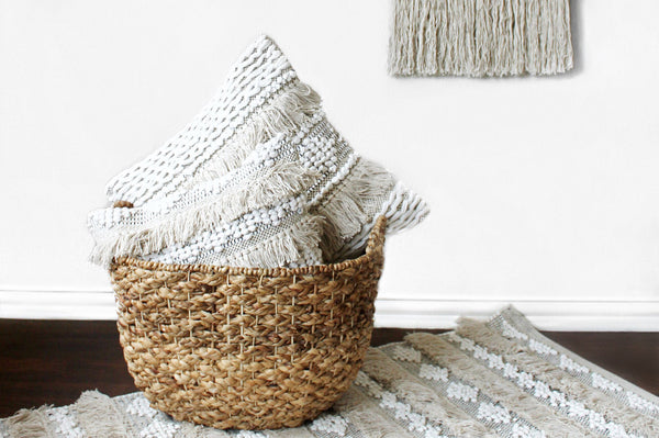 casa boho neutral cotton textured sea pillow cover with fringe beige Boho bohemian neutral decor cotton throw pillow tan beige white cream taupe pictured in basket in room with neutral decor