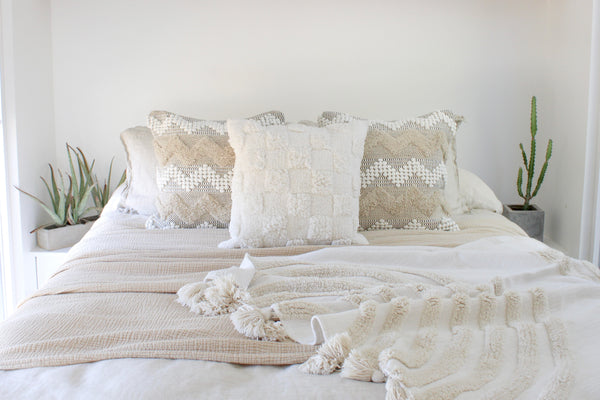 casa boho home decor boho throw pillows decorative pillow covers bohemian pillows boho pillows neutral home decor beige cream white tan taupe soft textures rainbow throw blanket rainbow blanket pom pom blanket cozy decor cozy home decor white walls