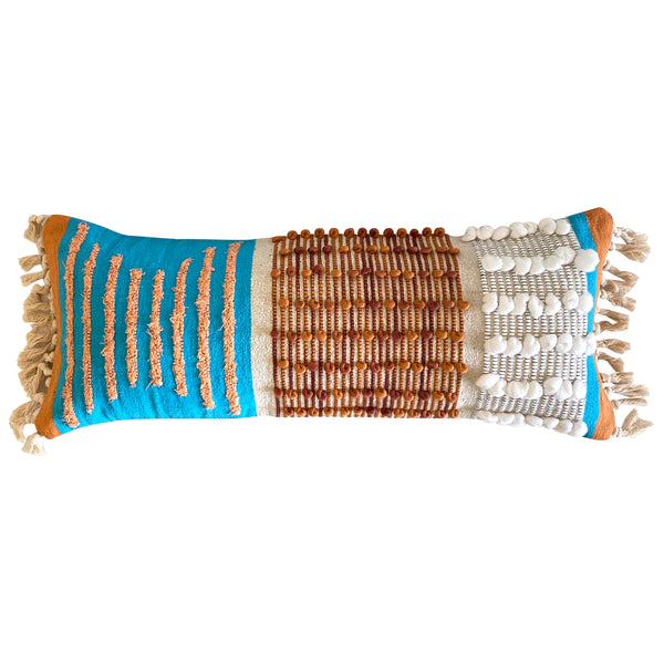 casa boho decorative lumbar pillow cover long cushion burnt orange rust colored coral salmon beige tan taupe white cotton wool tassels tassel fringe fringed texture textured mid century modern bohemian eclectic interior stylist designer decorator decorating home decor living room bedroom sofa couch chair crib bed bench outdoor indoor loops aqua blue turquoise contemporary 12x30 inches